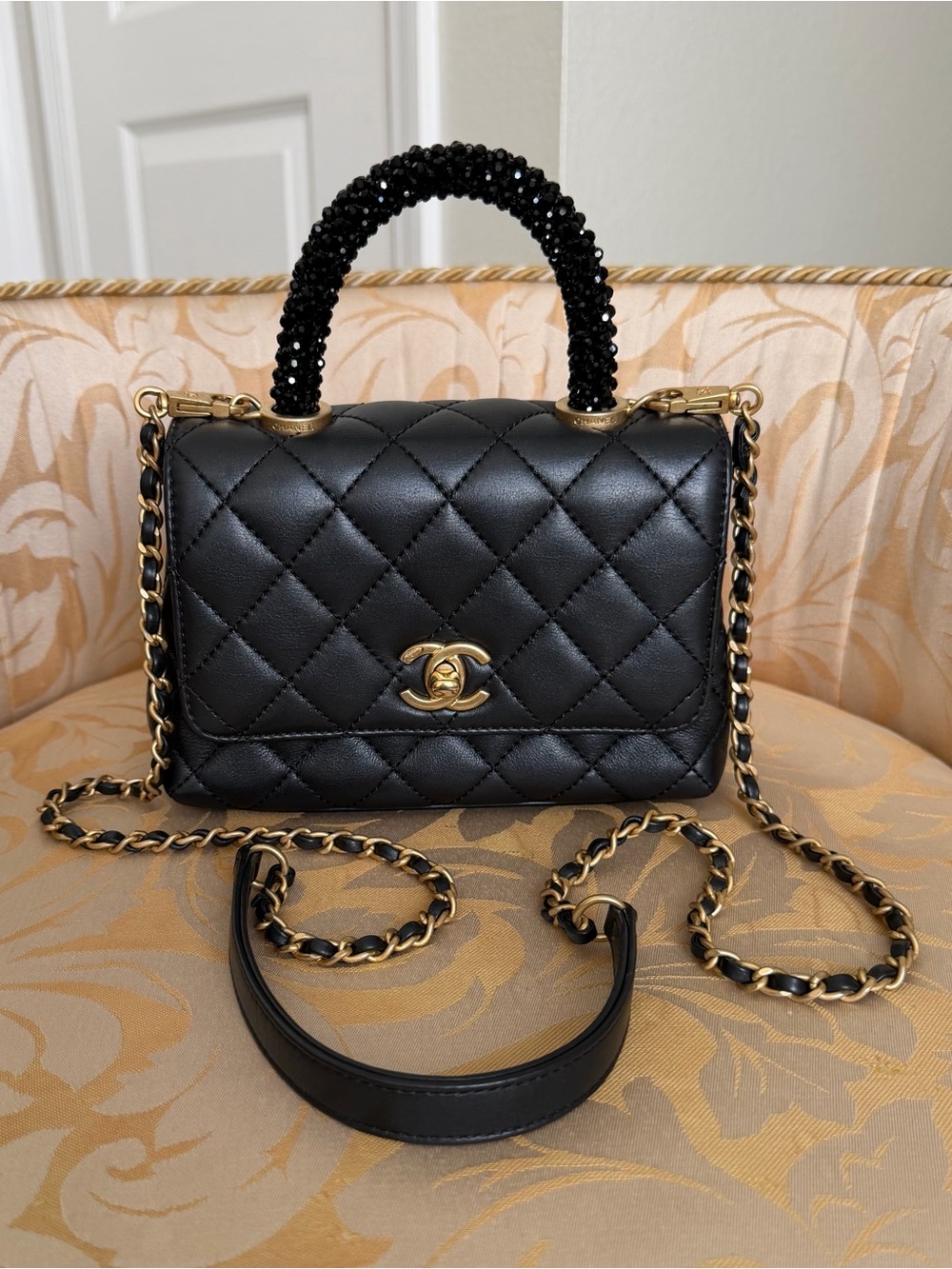 CHANEL Mini Flap Black Quilted Lambskin with Beaded-Handle Shoulder Bag